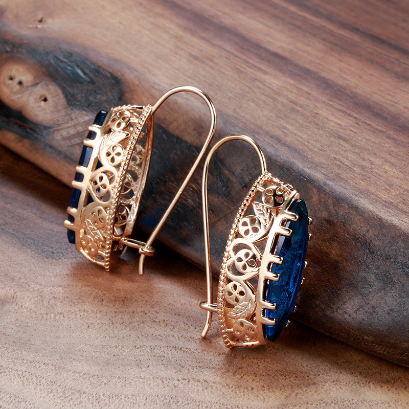 Златен дамски комплект колие + обеци син камък