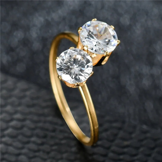 Златен дамски пръстен с двоен камък