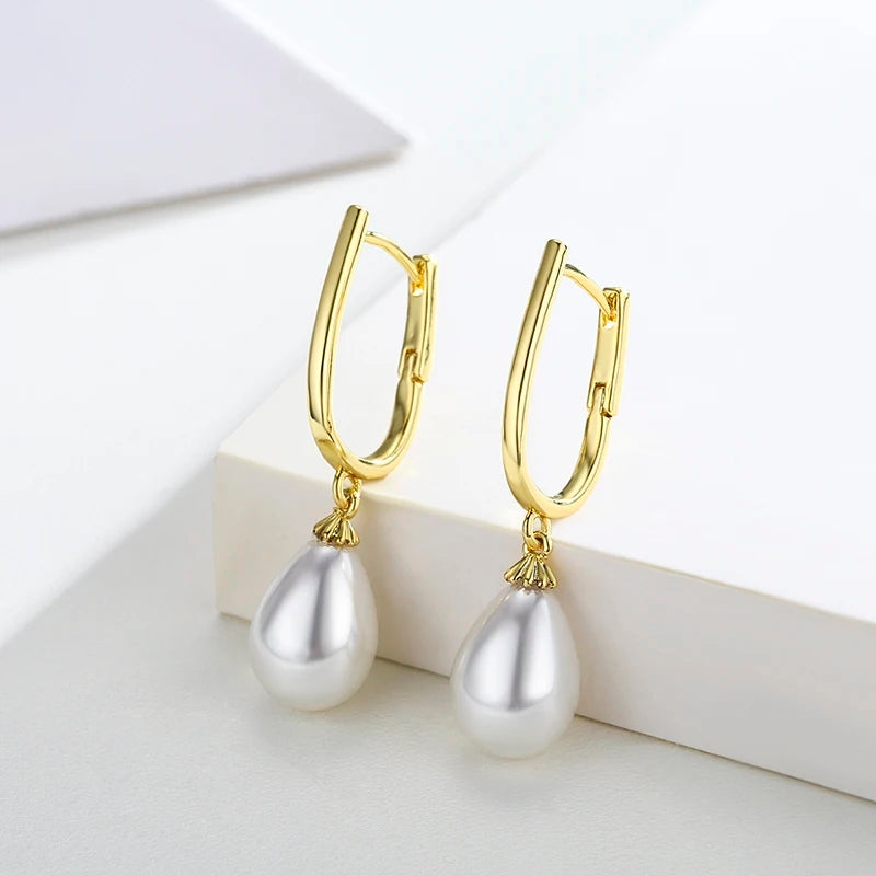 Златни дамски обеци с перли