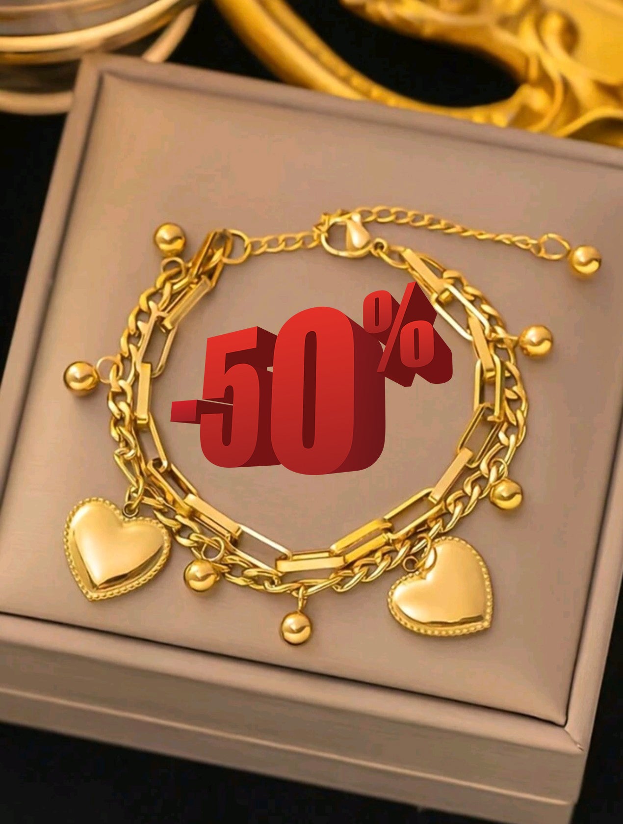 Златна дамска гривна сърчица