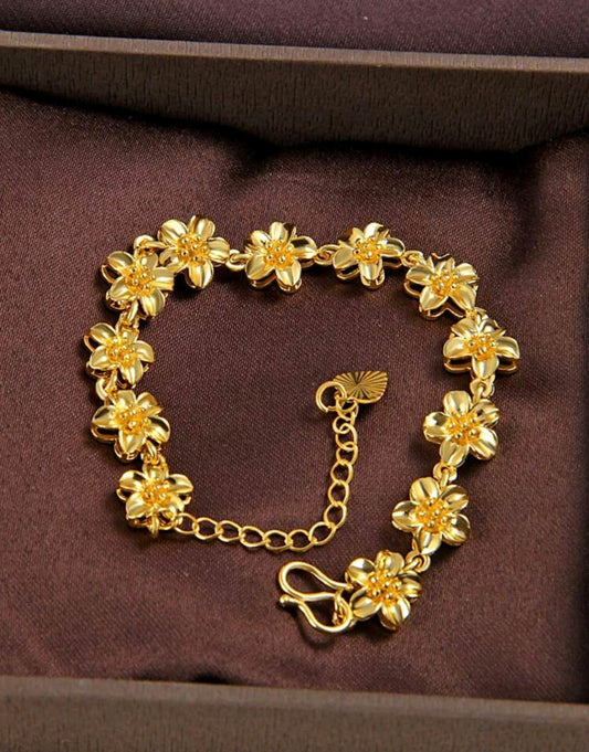 Златна дамска гривна с цветчета