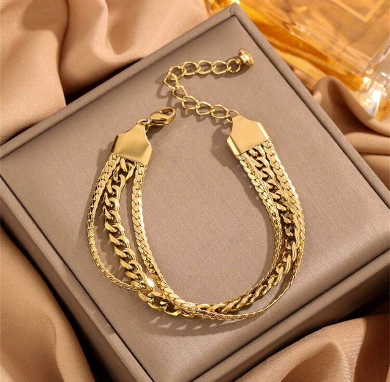 Тройна златна дамска гривна