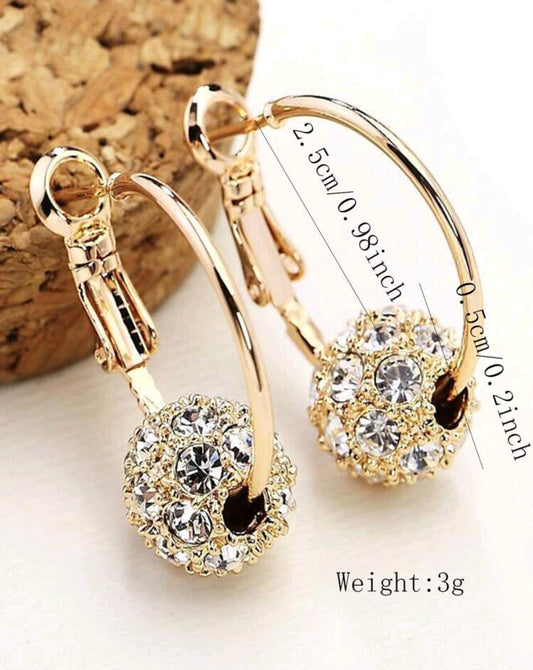 Златни детски обеци с висулка топче