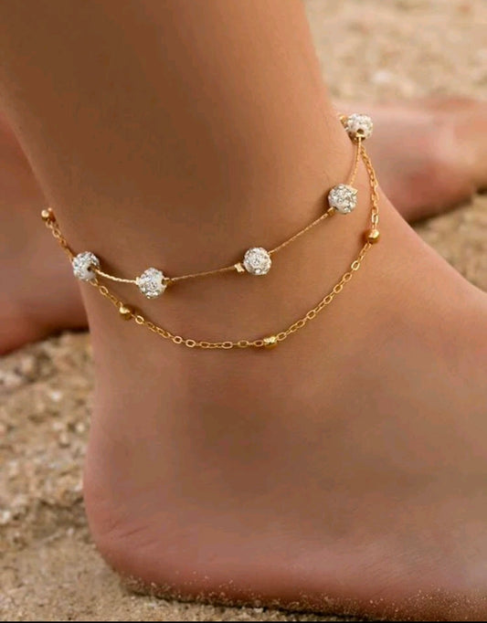 Златна дамска гривна за крак (глезен)